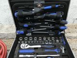 a tool case with tools in it on the ground