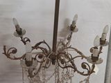 a chandelier with a bunch of crystal beads hanging from it
