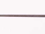 a sword that is laying on a white surface