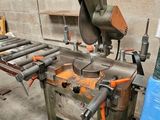 an image of a machine that is working on a piece of wood