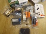 a lot of electronic items that are on the table