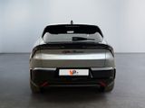 a car that is parked in a room with a white wall