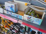 a lot of toys on the shelves in the store