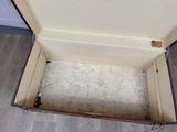 an open suitcase sitting on the floor on the floor