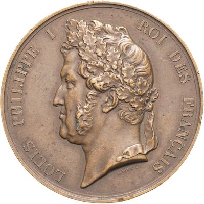 an old coin with a woman ' s head on it on a white background