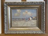 an oil painting of a beach scene with a wooden easel