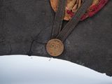 an image of a hat with a medal on it