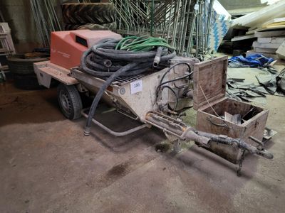 an image of a machine that is sitting in a garage