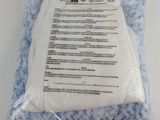 a close up of a bag of toilet paper on a white surface