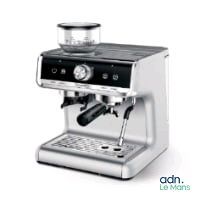an image of a coffee machine with a cup on top of it