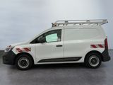a white van with red stripes parked in a room
