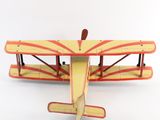 a toy airplane that is sitting on a white surface