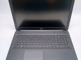 the dell laptop is open and ready to be used