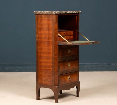 an old wooden cabinet with a marble top and drawers