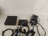 a lot of wires and cords on the table
