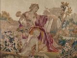 an image of a tapestry with a woman and child in a garden