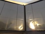 a large metal box that is open on the floor