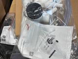 a cardboard box full of assorted items in it