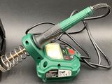 someone is using a soldering machine to solde a coil of wire