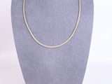 a gold chain necklace on a mannequin mannequin mannequin mannequin mannequin mannequin mannequin mannequin manne