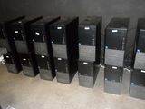 a lot of computer equipment that are sitting on the floor