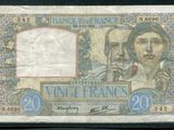 un ancien billet de banque sur lequel figurent les portraits d'un homme et d'une femme