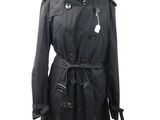 a black trench coat on a mannequin mannequin mannequin mannequin mannequin mannequin mannequin mannequin manne
