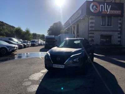 a car parked in front of a building on the street