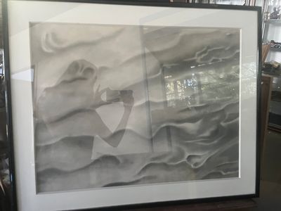 une photo d'une photo représentant un homme dans un bateau sur l'eau