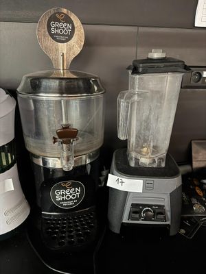 a blender and a blender sitting on a counter