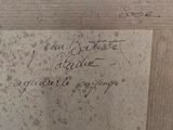 a close up of a piece of writing on a piece of wood