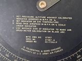 a close up of a dial on the side of a clock