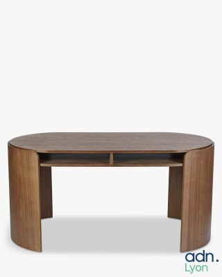 an oval coffee table with a shelf on top of it