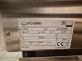 une photo d'un lave-vaisselle en acier inoxydable sur lequel est apposée une étiquette