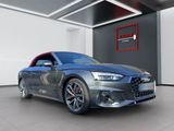 the audi rs4 coupe is shown in a showroom