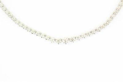 a white necklace with a silver chain that has small crystals on it