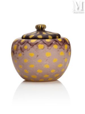 purple and yellow glass jar with polka dots on the lid