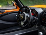 a close up of a steering wheel and dashboard of a car