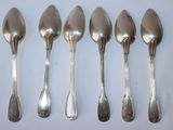six spoons are lined up in a row on a white surface
