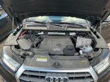 a car with its hood open with the hood open