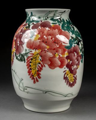 CHINE - XXème siècle. VASE ovoïde à décor de fleurs et d'ois…