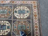a person standing on a rug with a pair of shoes