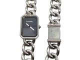 a watch that is attached to a chain bracelet
