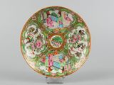 a plate with a design on it on a stand
