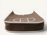 a brown and white purse with a white word on it