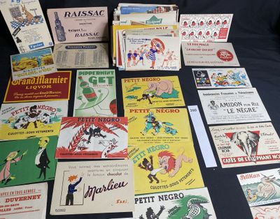 many different types of advertising cards laid out on a table