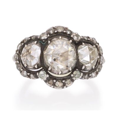 an antique diamond three stone ring
