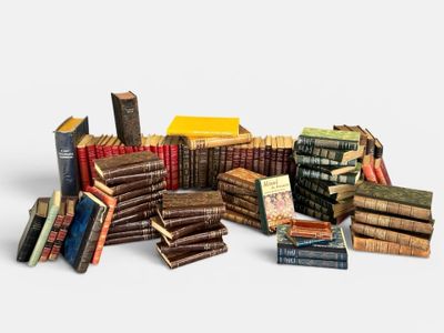 many old books stacked on top of each other