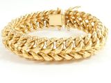 a gold bracelet with a chain link and a clasp