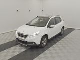 a picture of a white car parked in a garage